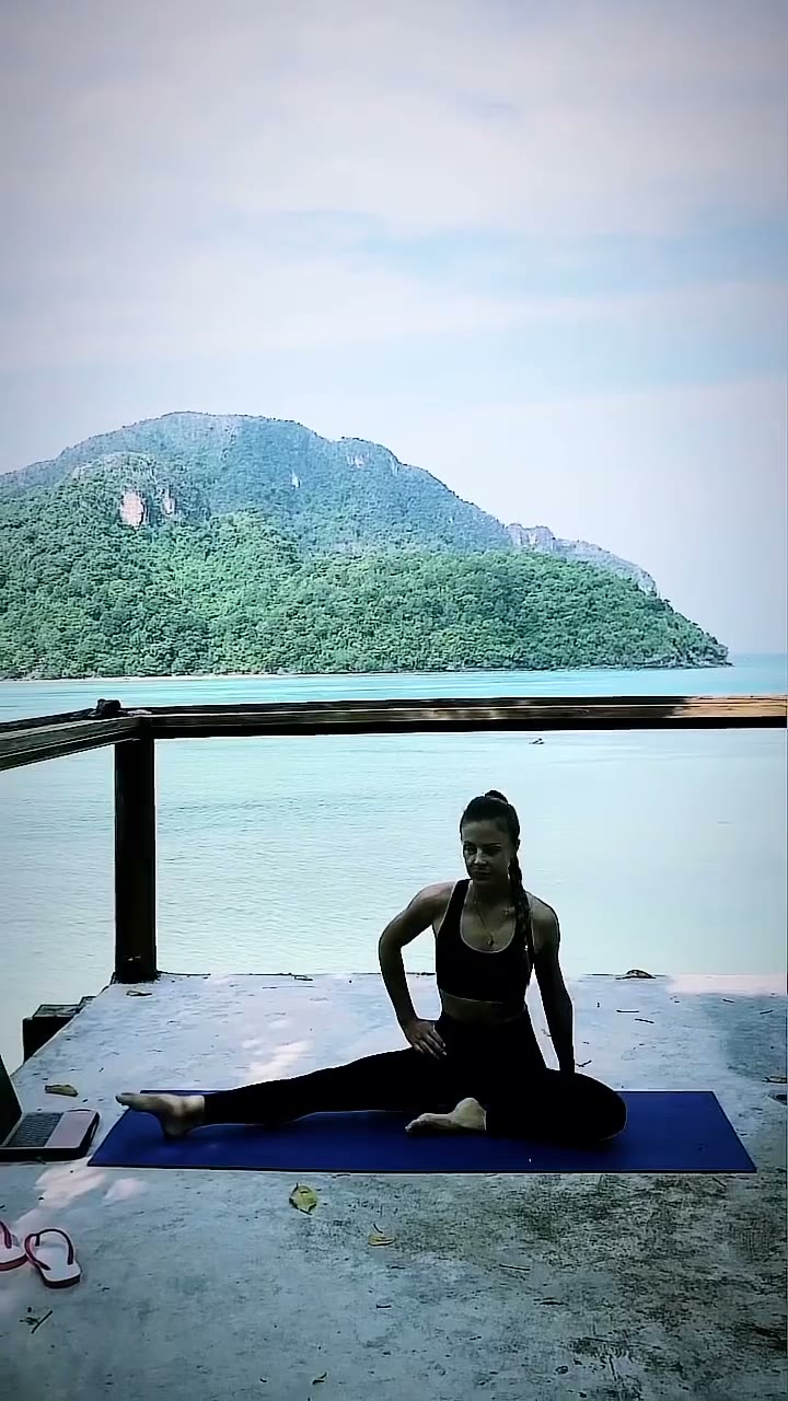 Mobility exercise on a mat with a mountain view